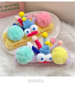 Plush wide headband with funny big eyes and colorful pom-poms for daily washing and cute styling.
