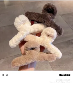 Detailed view of the oversized furry hair claw in meillard style, soft plush texture.