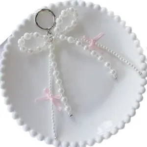 Korean style pearl bow keychain phone charm elegant bag accessory sweet aesthetic cute pendant