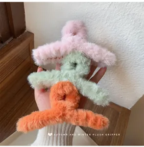 Oversized plush hair claw clip for women, winter fluffy shark hair catch hairpin accessory.