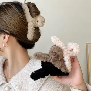 Oversized plush hair claw clip for women, soft fuzzy hair accessory for thick hair autumn winter.