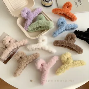 Fluffy plush hair claw clips in assorted colors, perfect cute winter hair accessories for women.