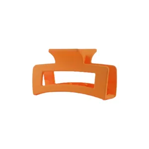 Matte orange square hair claw clip, minimalist geometric design for daily styling main view.