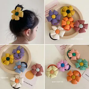 Simpatici elastici per capelli in tessuto a fiore per bambini, accessori colorati per code.