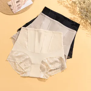 High waist tummy control shapewear brief details showing lace stitching and shaping boning lines.