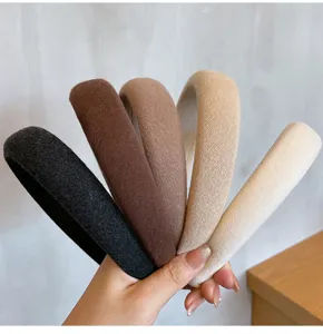 Detailed view of thick sponge headbands in multi-colors, soft fabric hair hoop for women.