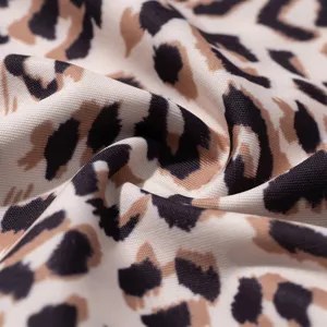 Detailed close up of women leopard print thong fabric showing soft ice silk texture.