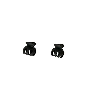 Black mini hair claw clips for women, cute pumpkin design hair accessories, strong hold.