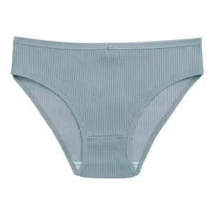 Close-up of ribbed seamless women underwear fabric, soft grey-blue texture detail view.