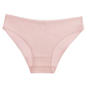 Detailed view of pink ribbed women underwear, soft and comfortable fabric for daily wear.