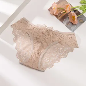 Beige lace floral hollow-out breathable women's briefs detail view, soft underwear.