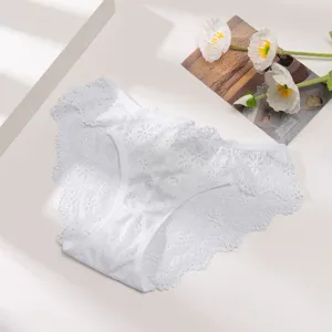 Detailed view of white floral lace women sexy panties breathable hollow brief underwear.