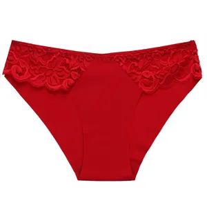 Detailed view of red lace women underwear, showcasing delicate embroidery and breathable fabric.