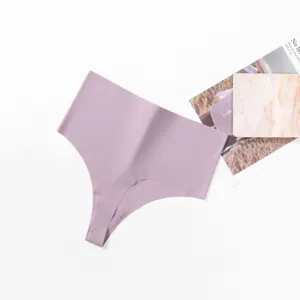Detailed view of the seamless high-waist solid purple thong, soft fabric and invisible fit.