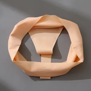 Seamless ice silk thong underwear detail view, smooth nude minimal design, soft fabric.