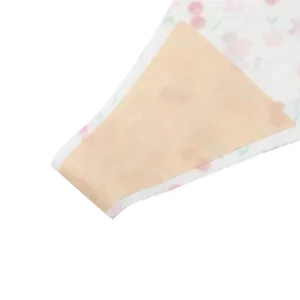 Close-up detail of women's seamless floral thong fabric and breathable crotch lining design.