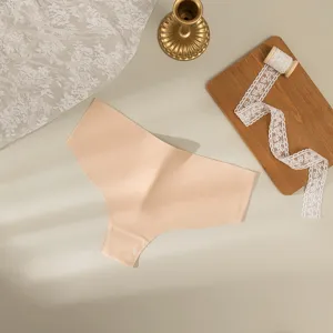 Detail view of smooth seamless nude women thong, minimalist comfort flat lay photography.