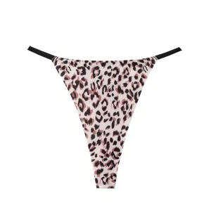 Detailed view of the women low waist leopard print thong with black side straps, seamless.