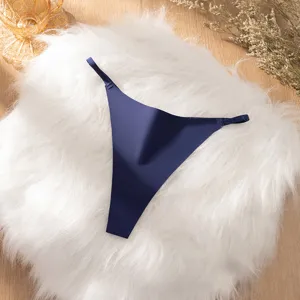 Solid blue ice silk seamless thong underwear for women, lightweight and breathable fabric detail.