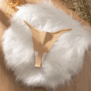 Detail view of women seamless nude thong, breathable ice silk fabric, comfortable daily underwear.