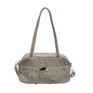 Lässige Nylon-Umhängetasche mit Falten-Kordelzug vorn, stylische Pendler-Handtasche für Damen.