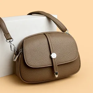 Echte leder damen umhängetasche schultertasche mit klappe und stilvollem metallverschluss.