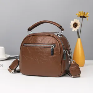 Koreanische weiche Leder Damen Kuppel Handtasche Mini mehrschichtige lässige Umhängetasche