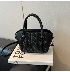 Schicke schwarze Handtasche mit Webtextur für Damen, retro vielseitige Umhängetasche.