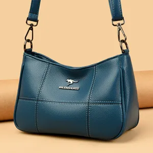 Dunkelblaue Damen Umhängetasche aus weichem Leder mit viel Stauraum und stilvollen Nähten.