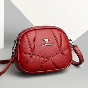 Rote Umhängetasche aus Leder für Damen, stilvolle geometrische Nähte runde Schultertasche.