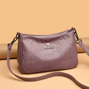 Echte Leder Damen Umhängetasche mit stilvollem geprägtem Blumenmuster für den täglichen Gebrauch.