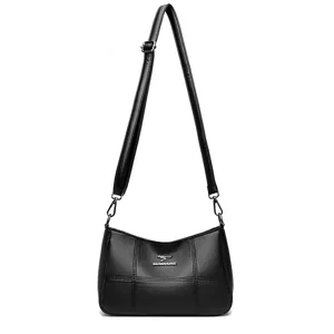 Damen schwarze weiche Leder Umhängetasche mit verstellbarem Riemen und elegantem modischen Design.