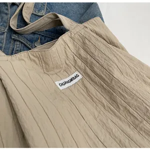 Beige gefaltete Tasche lässige große Kapazität Umhängetasche Stofftasche für Damen