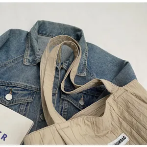 Lässige gefaltete Segeltuch Tragetasche für Damen, große Schultertasche für den Alltag.