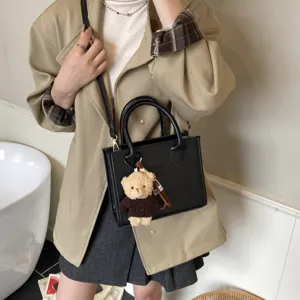 Modische Herbst neue vielseitige Umhängetasche Eimer Handtasche mit süßem Plüschbär.