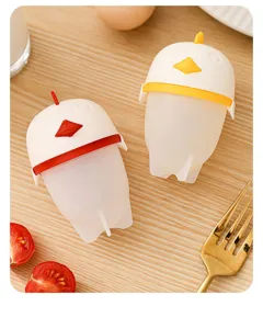 Cute silicone boiled egg cups, non-stick kitchen steamer tools in chick shape for home.