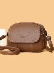 Klassische braune Leder Schultertasche fuer Damen, stylische Mini Umhaengetasche.