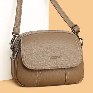Echtes Leder Damen Mini Umhängetasche, stilvolle Freizeittasche mit praktischen Reißverschlüssen.