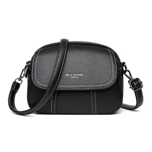 Schwarze Umhängetasche aus echtem Leder für Damen, stylische Mini-Tasche mit Klappe.