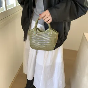 Retro Leder gewebte Eimer Tasche für Damen, koreanische schicke Umhängetasche Handtasche.