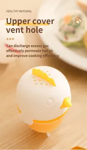 Silicone egg boiler cup with cute cartoon chick design, heat resistant and reusable detail.