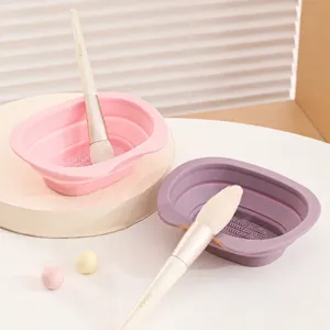 Collapsible silicone makeup brush cleaning bowl, portable tool for washing cosmetics.