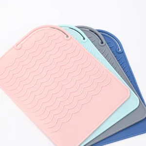Tappetino termoresistente in silicone per ferro arricciacapelli, supporto antiscivolo.