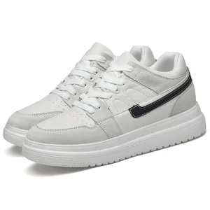 White casual sports skate shoes with thick platform sole and stylish black side stripe design main view