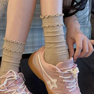 Cozy cotton mid-calf socks featuring cute ruffled lace cuffs, perfect for ballet core aesthetic daily wear.
