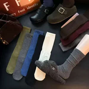 Retro jacquard mid tube socks for women, vintage knit casual hosiery for daily wear.