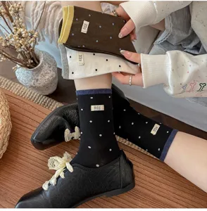 Dames stippen middellange sokken met ei label, casual herfst winter katoenen sokken.