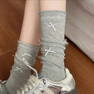 Grey slouch socks featuring cute white bow details, perfect for balletcore and JK sweet style outfits.