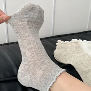 Women summer thin mesh socks with cute ruffles, breathable casual mid-calf socks for daily wear.