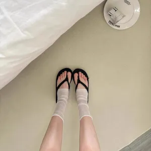 Korean style ultra-thin sheer foot socks paired with stylish sandals for summer wear.